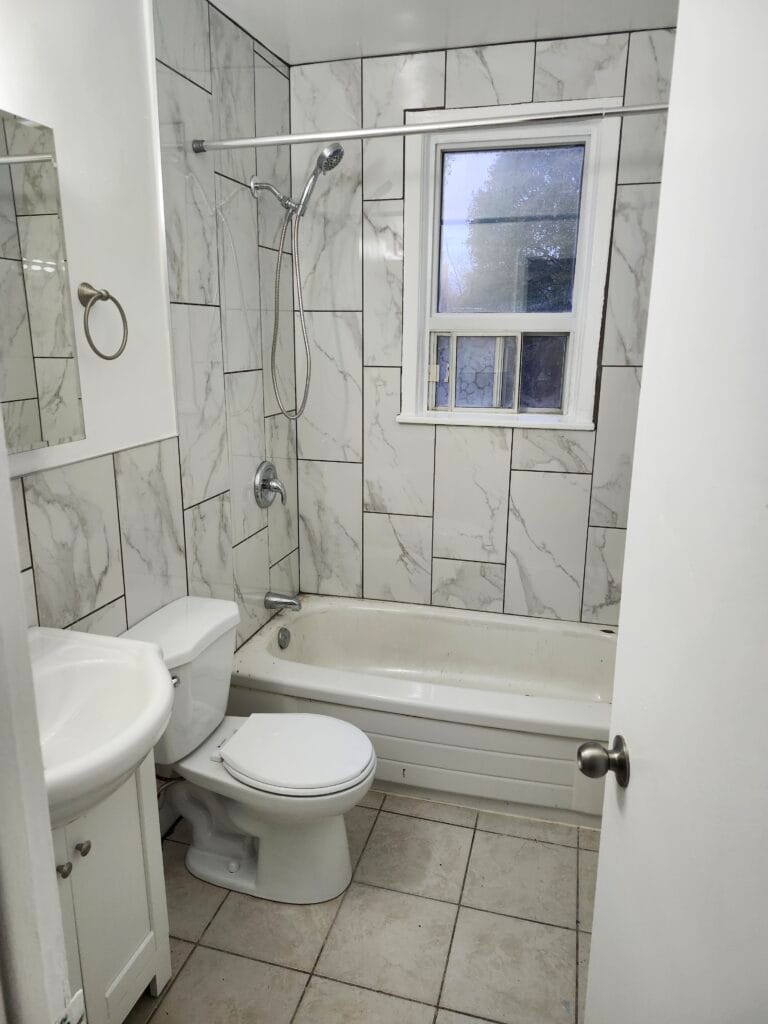 Bathroom renovation with marble-look wall tile Toronto – MT Renovations